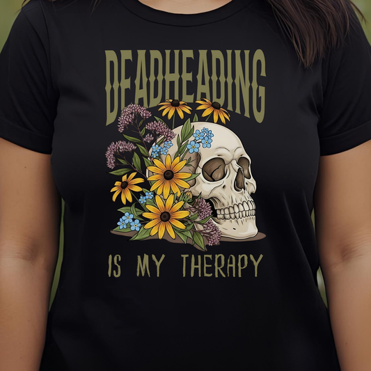 Black t-shirt with a skull and flowers design and text 'DEADHEADING IS MY THERAPY'.