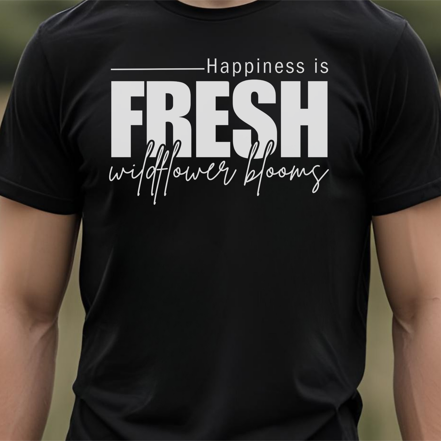 Black t-shirt with text 'Happiness is fresh wildflower blooms'.