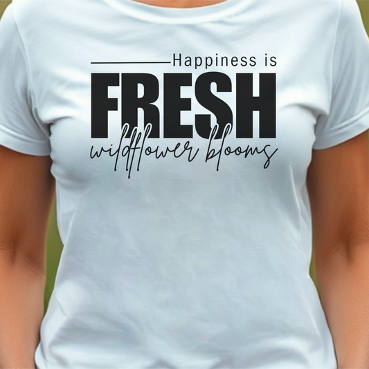 White t-shirt with text 'Happiness is fresh wildflower blooms'.