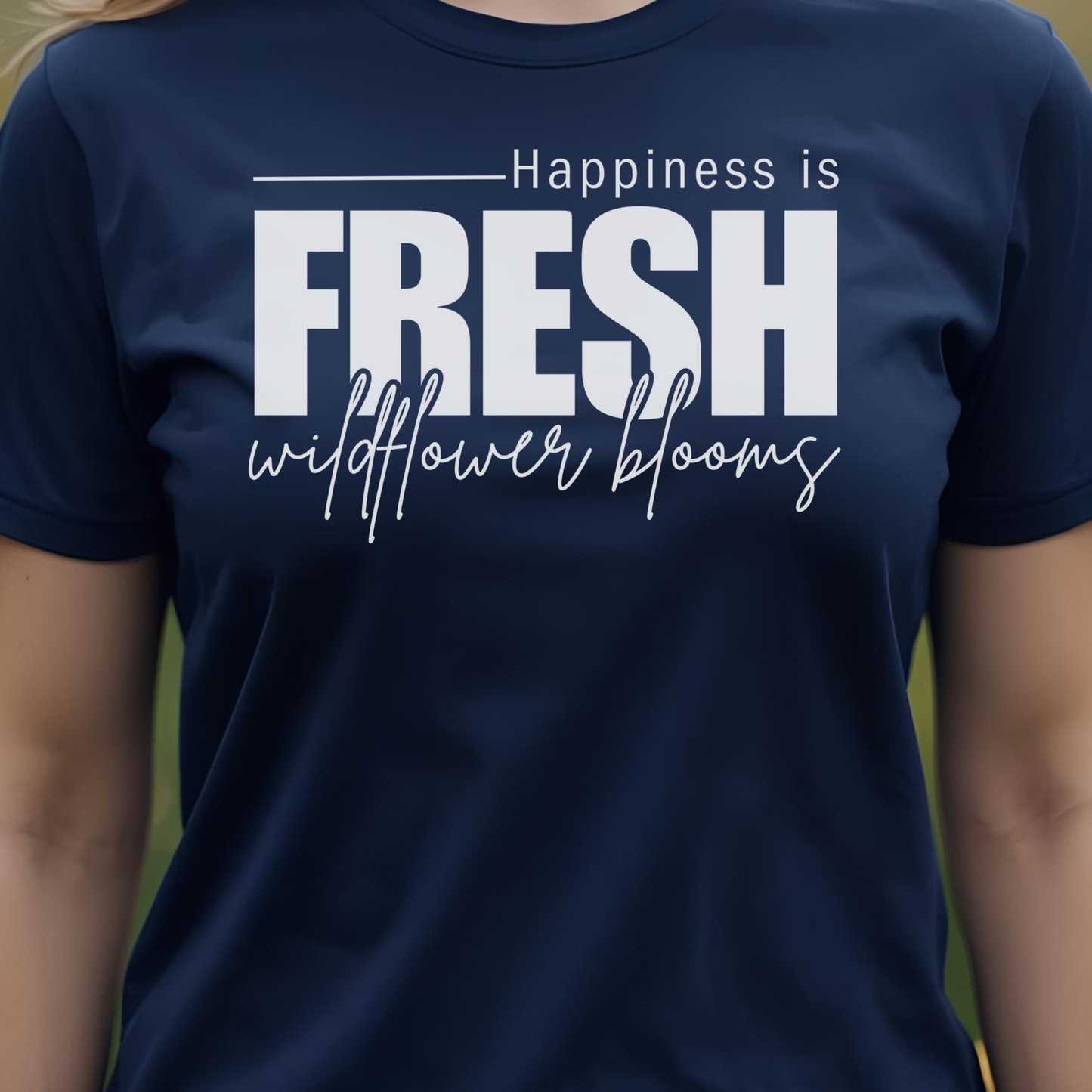 Navy t-shirt with text 'Happiness is Fresh Wildflower Blooms'.