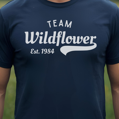 Navy t-shirt with 'Team Wildflower Est. 1984' text.