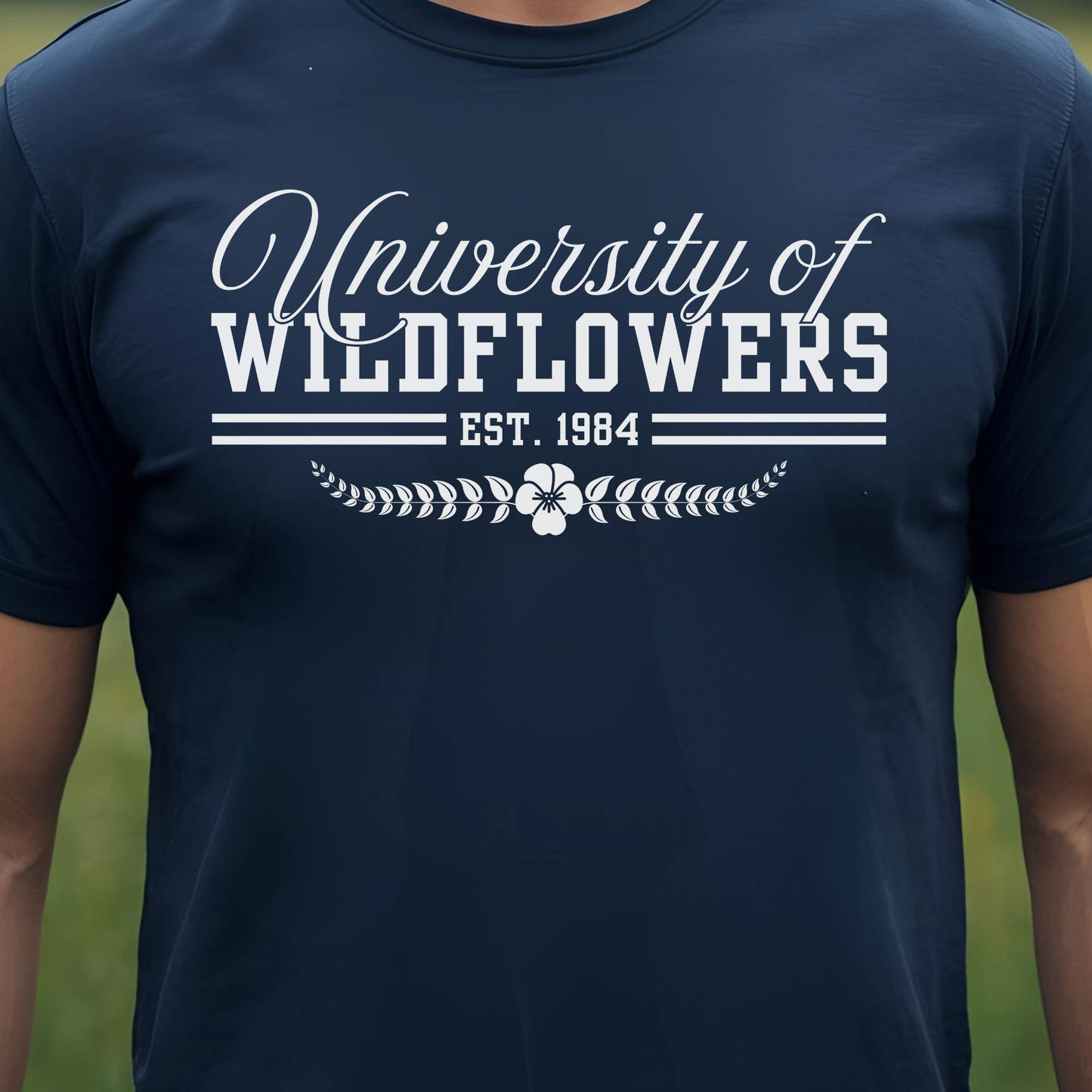 Navy t-shirt with 'University of Wildflowers' text and design.