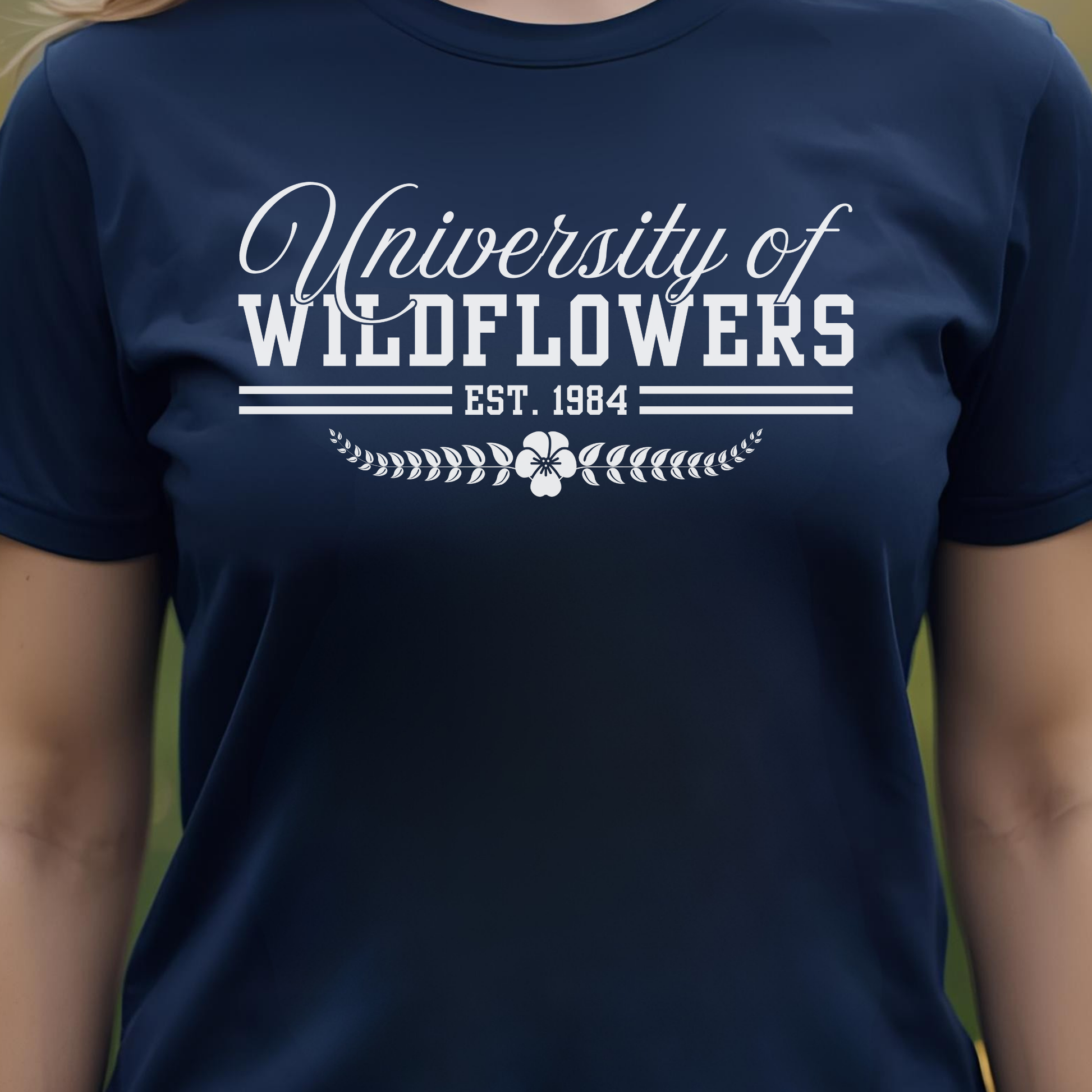Navy t-shirt with 'University of Wildflowers' text.