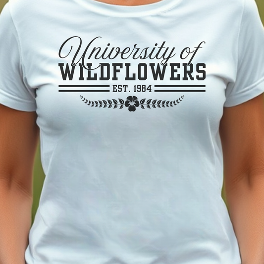 White t-shirt with 'University of Wildflowers'.