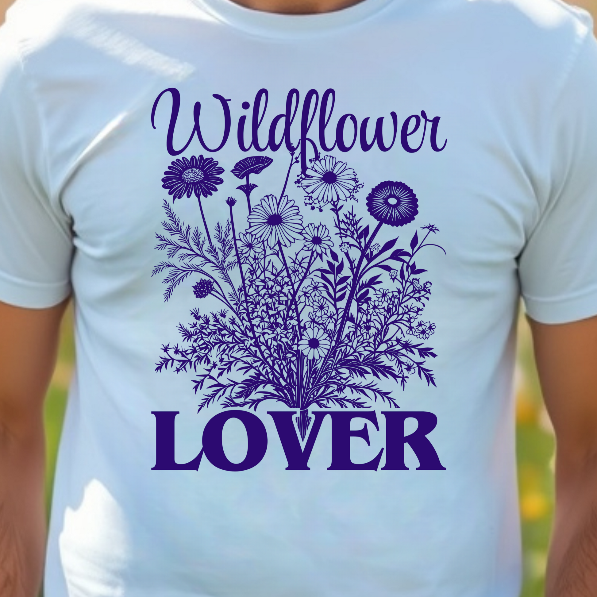 White t-shirt with floral design and text 'Wildflower Lover'.