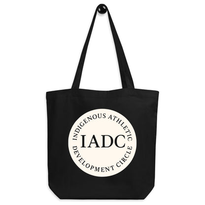 Black tote bag with 'IADC' logo.