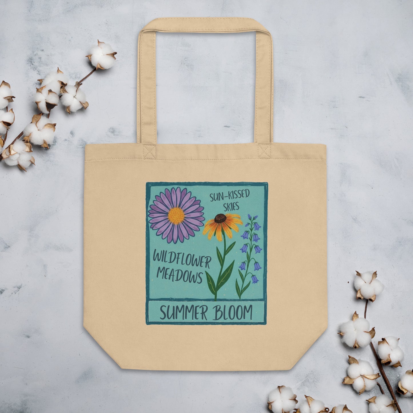 Beige tote bag with floral design and text.