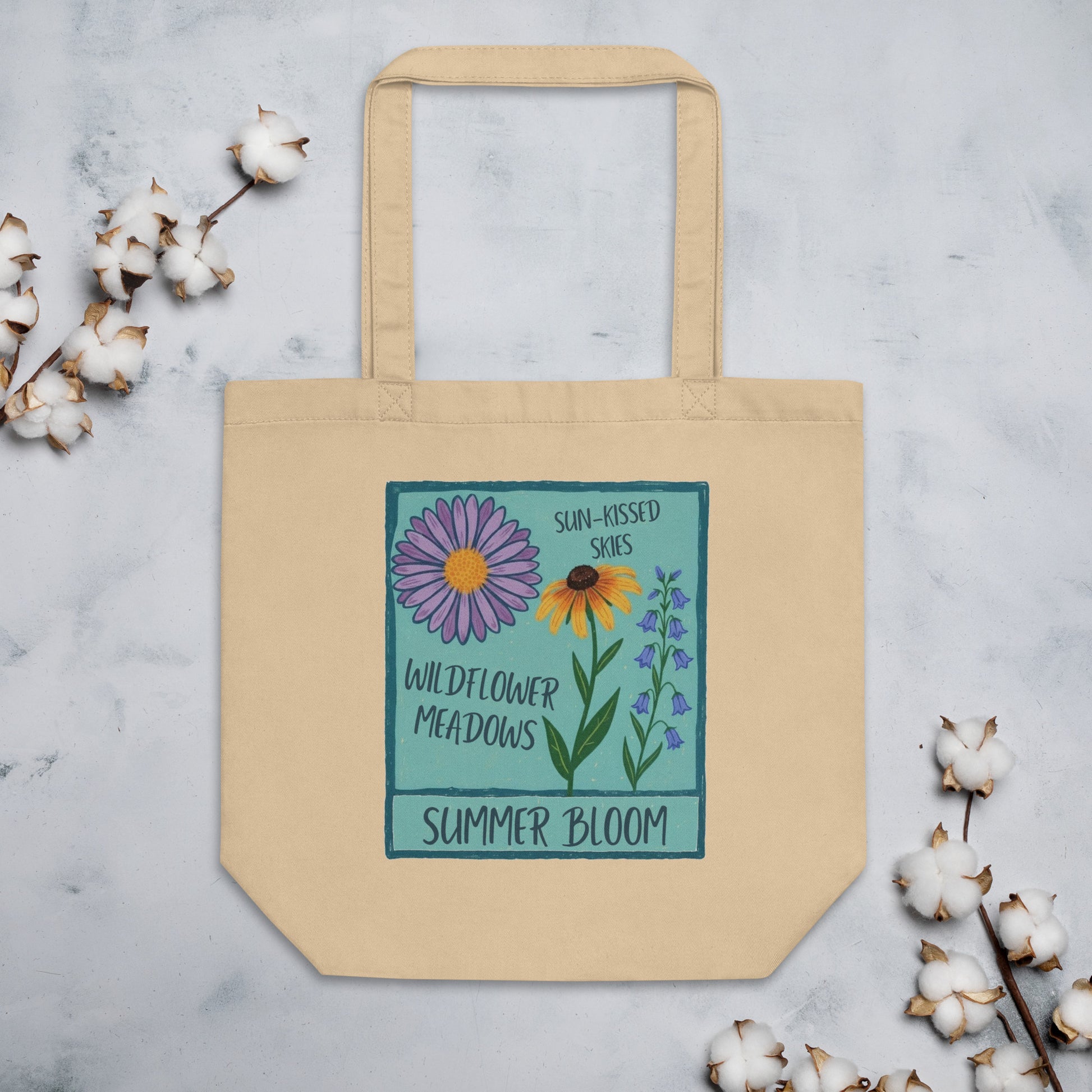 Beige tote bag with floral design and text.