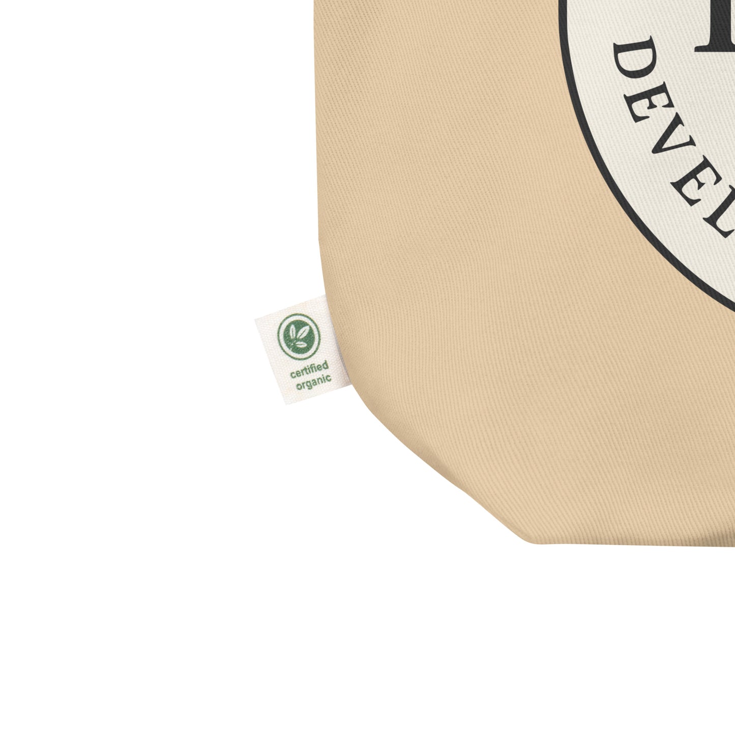Beige tote bag with a certified organic label.