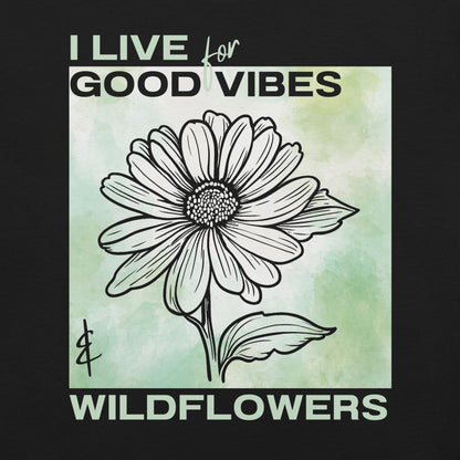 Black t-shirt with flower illustration and 'I Live for Good Vibes & Wildflowers' text.