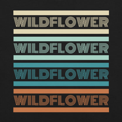 Black t-shirt with 'WILDFLOWER' text in colorful stripes.