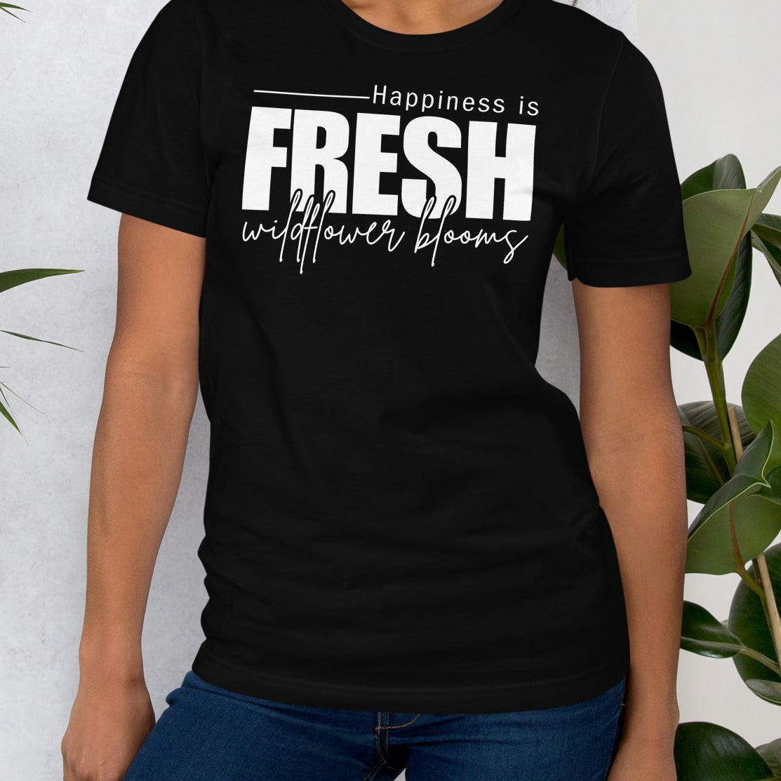 Black t-shirt with text "Happiness is fresh wildflower blooms".