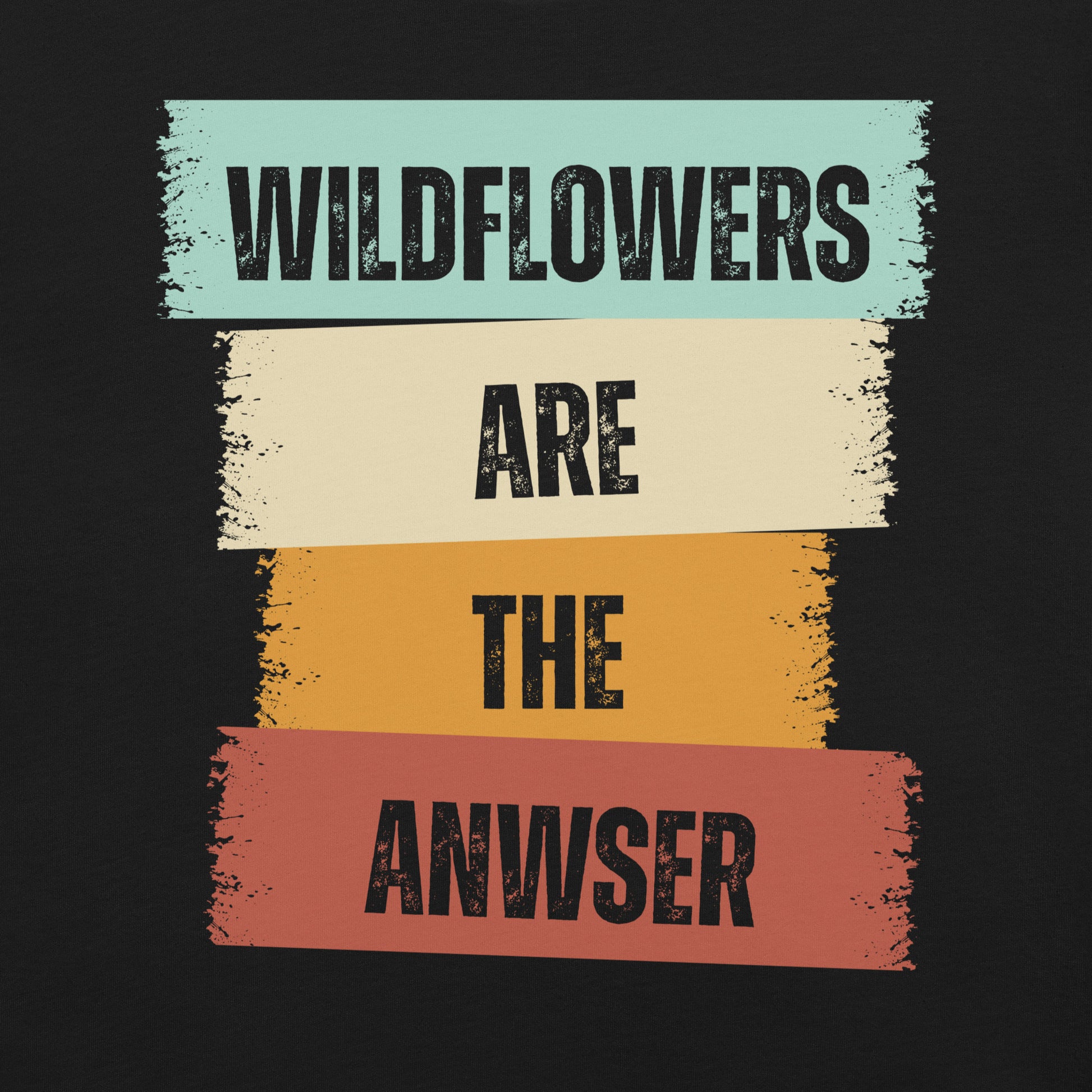 Black t-shirt with text 'WILDFLOWERS ARE THE ANWSER'
