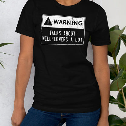 Black t-shirt with text.