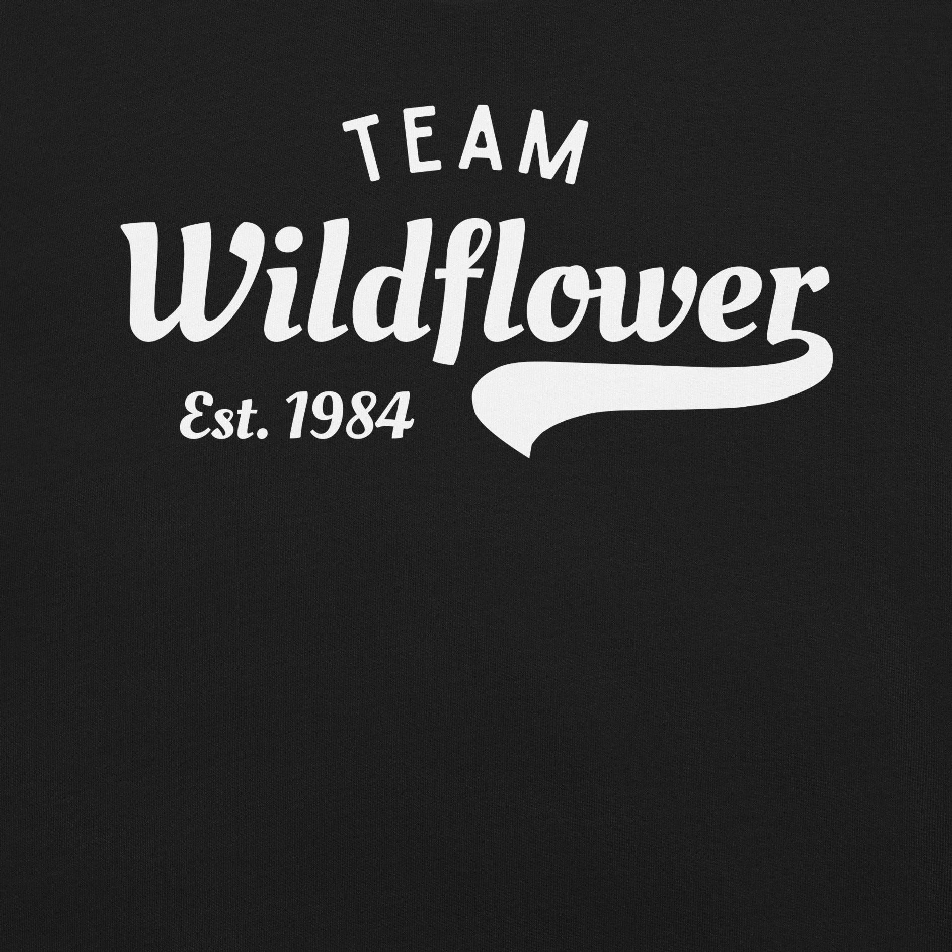 Black t-shirt with 'Team Wildflower Est. 1984' text.