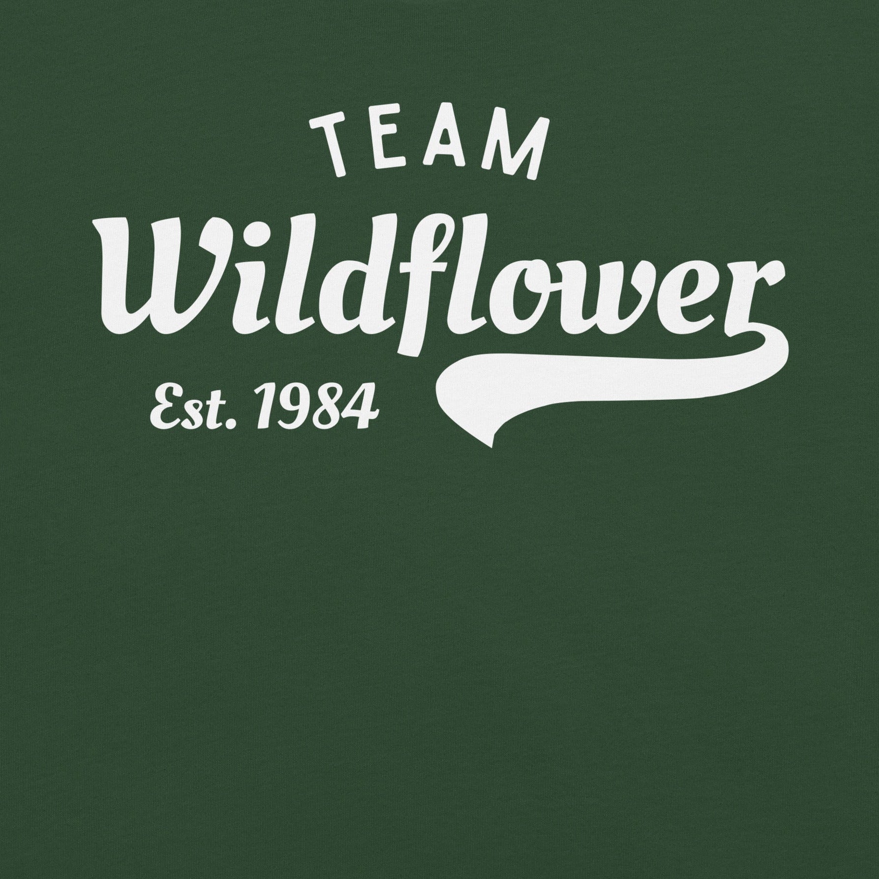 Forest green t-shirt with 'Team Wildflower Est. 1984' text.