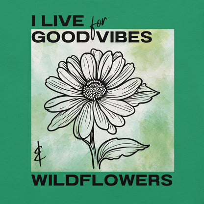 Kelly t-shirt with flower illustration and 'I Live for Good Vibes & Wildflowers' text.