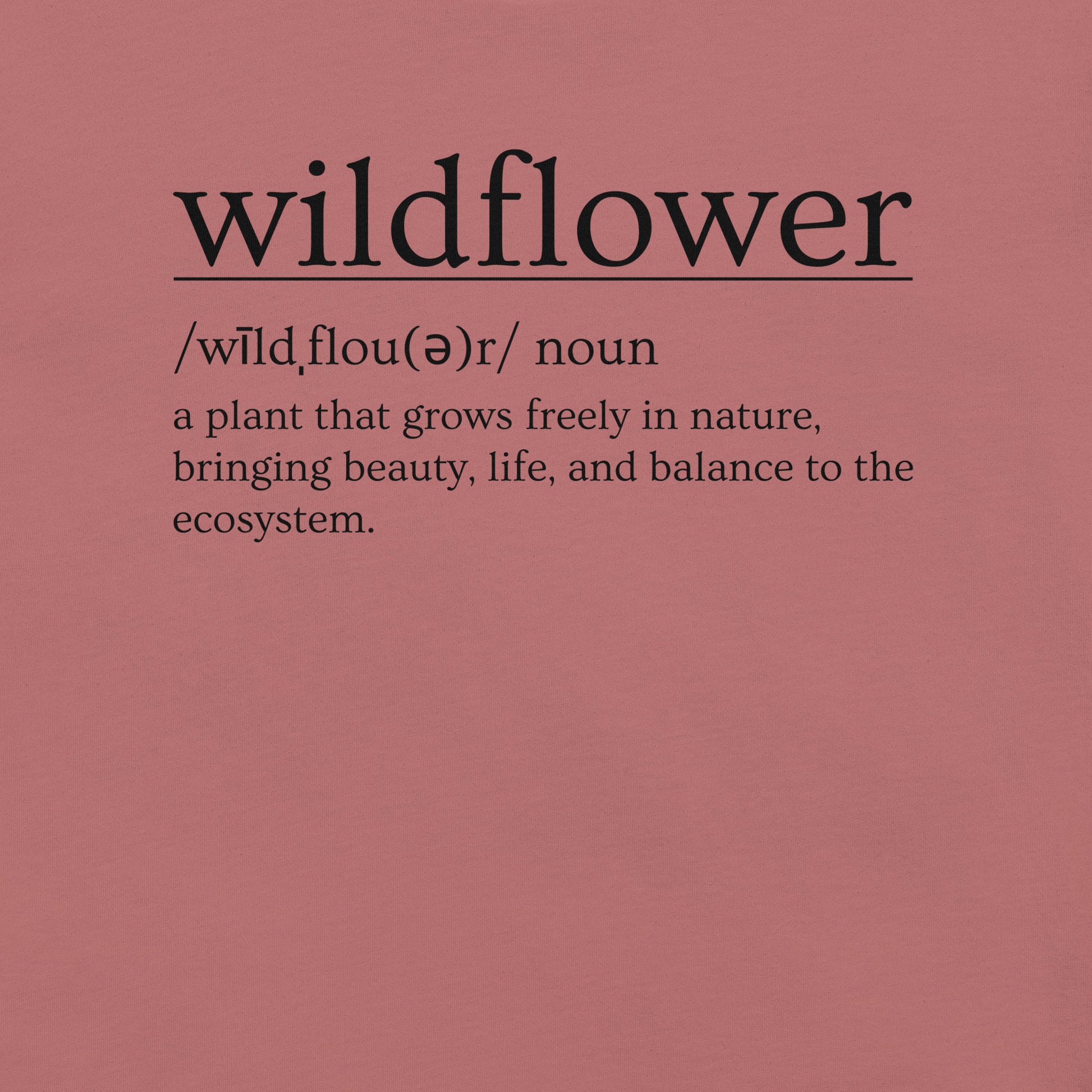 Mauve t-shirt with definition of 'wildflower'.