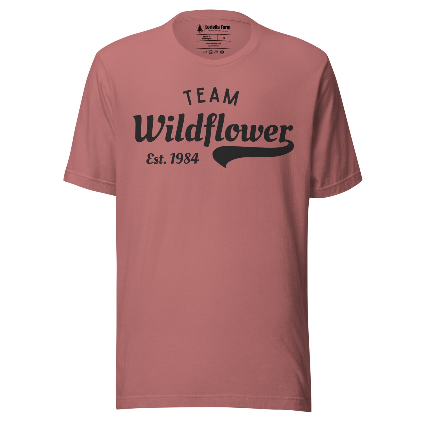 Mauve t-shirt with 'Team Wildflower Est. 1984' text.