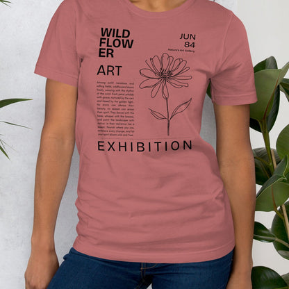 Mauve t-shirt with 'Wildflower Art Exhibition' design.