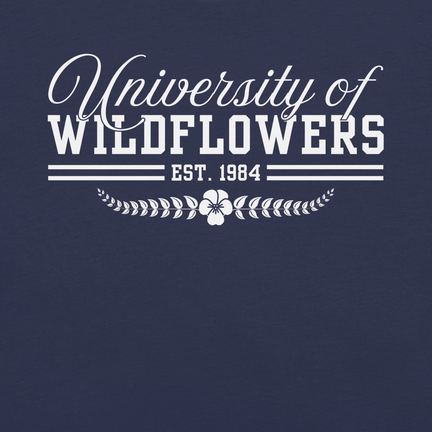 Navy t-shirt with text 'University of Wildflowers Est. 1984'.