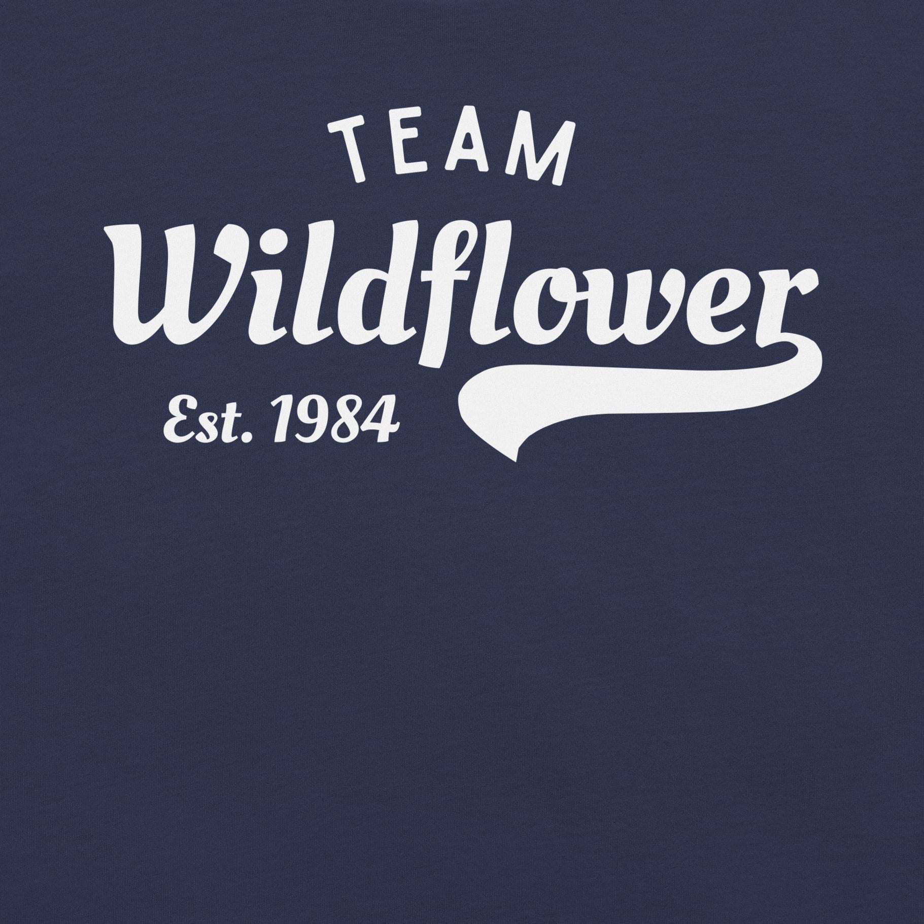 Navy t-shirt with 'Team Wildflower Est. 1984' text.
