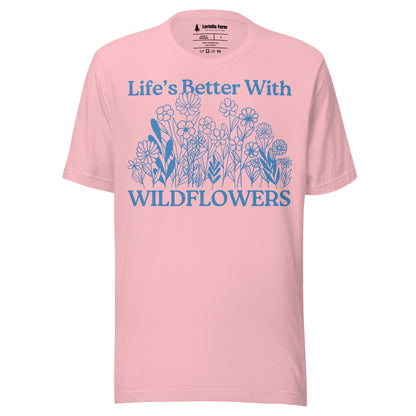 Pink t-shirt with floral design and text.