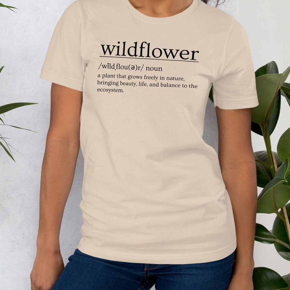 Soft Cream t-shirt with definition of 'wildflower'.