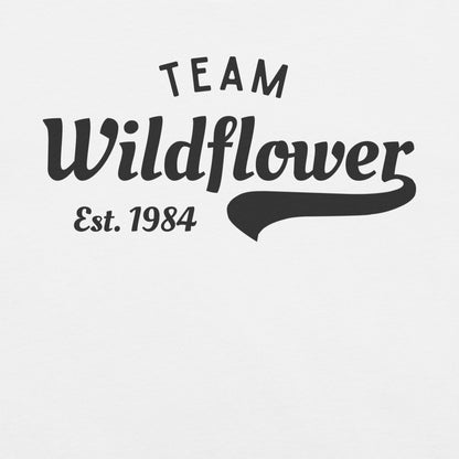 White t-shirt with 'Team Wildflower Est. 1984' text.