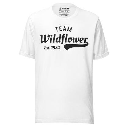White t-shirt with 'Team Wildflower Est. 1984' text.
