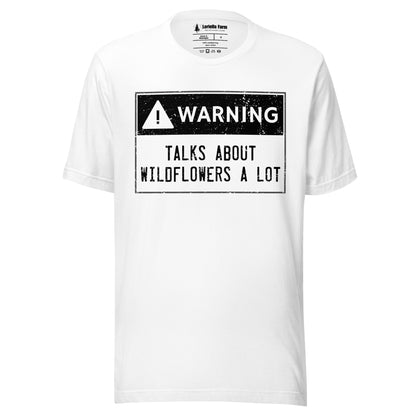 White t-shirt with a warning sign graphic and text.