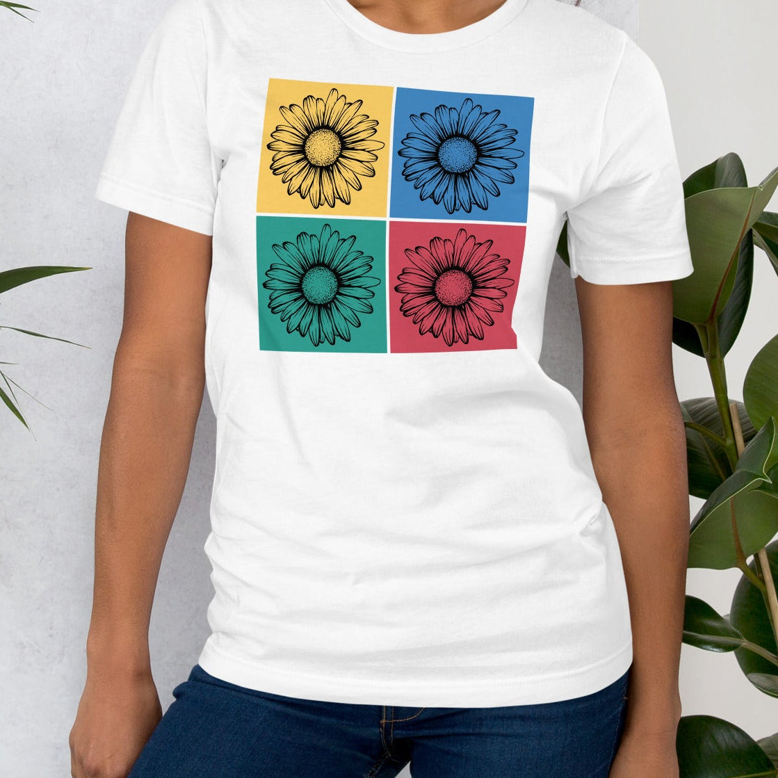 White t-shirt with colorful floral designs.