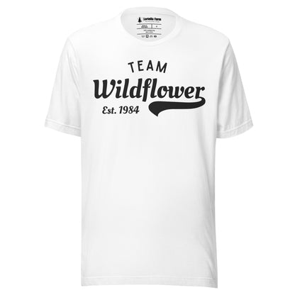 White t-shirt with 'Team Wildflower Est. 1984' text.