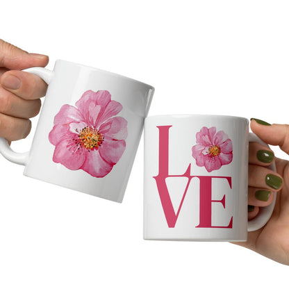 White mugs with floral and 'LOVE' design.