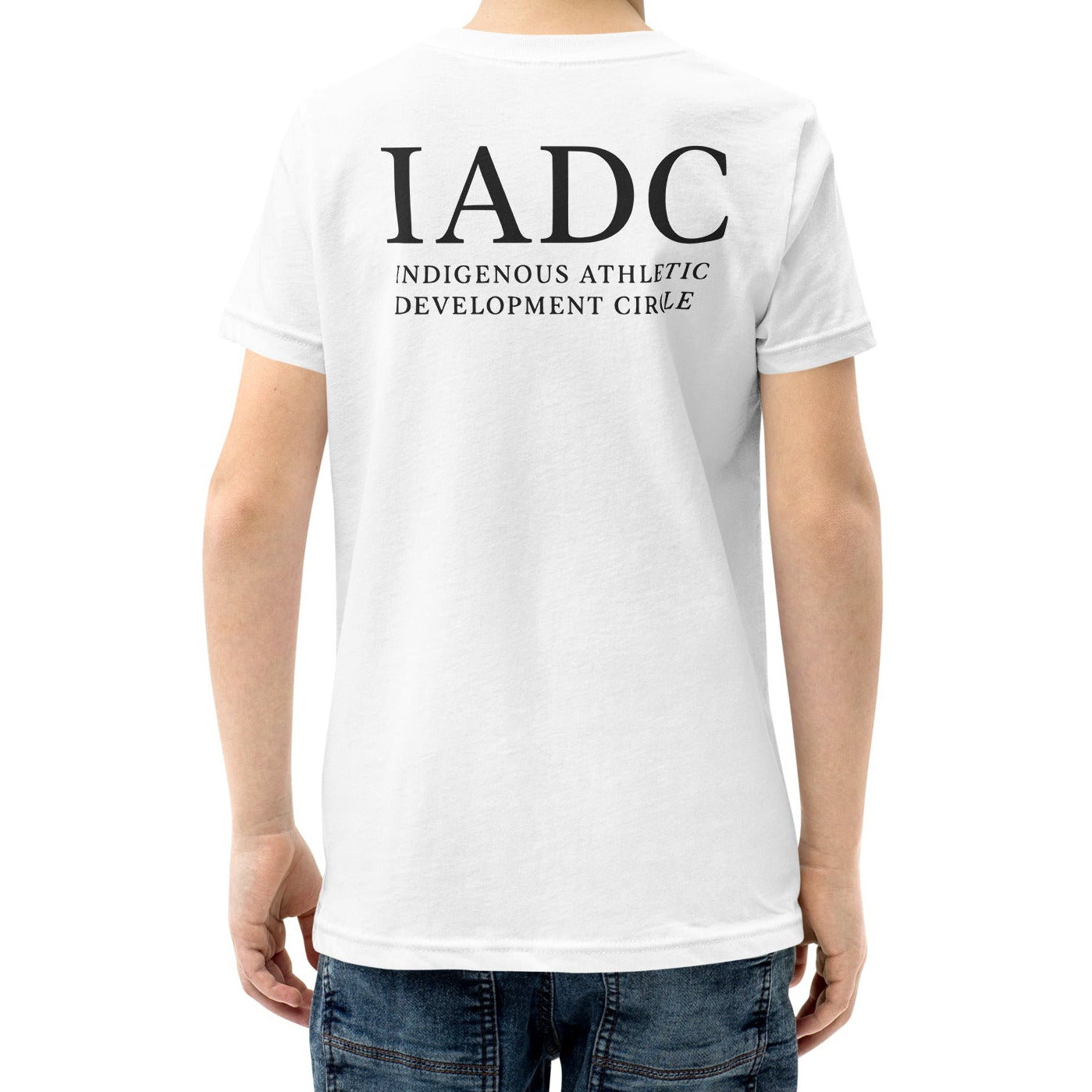 White t-shirt with 'IADC' and 'Indigenous Athletic Development Circle' text on the back.